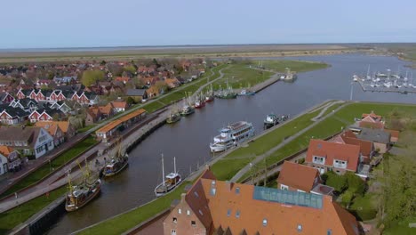 Drone-flight-over-a-beautiful-small-fishing-village-in-germany