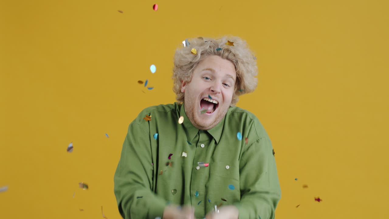 Man celebrating with confetti