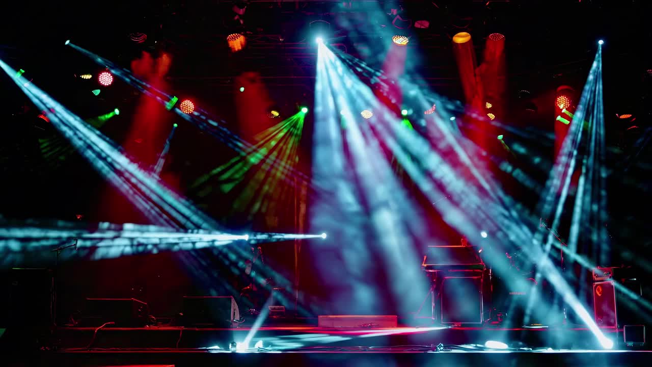 Vibrant concert stage with colorful lights and smoke, captured from a low angle, creating a dynamic