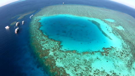 aerial drone shot for abu nuhas coral reef dive site in `the red sea of egypt