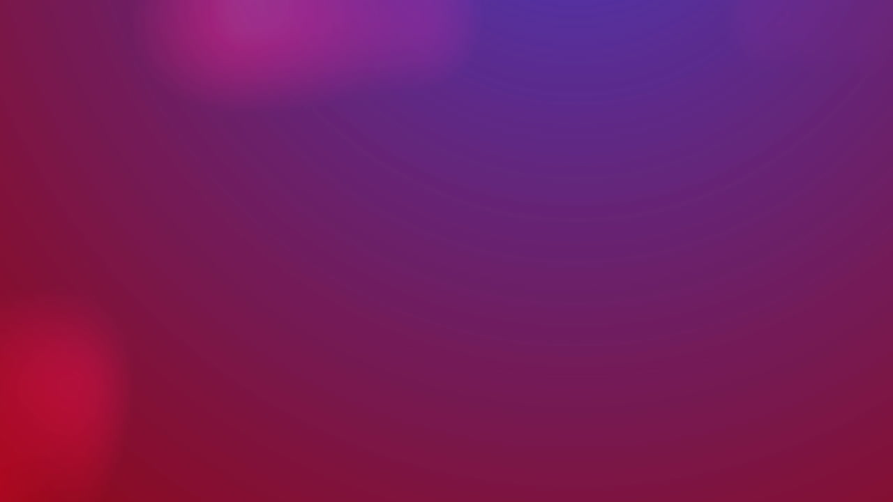 Digital animation of spots of light moving against pink and purple gradient background