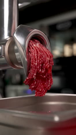 meat grinder in action