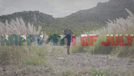 animation of text independence day over african american woman walking in mountains