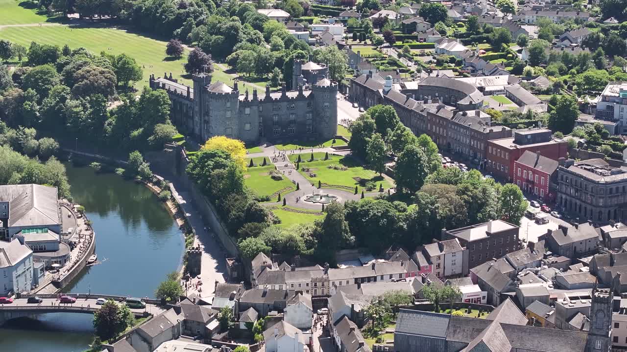 Kilkenny Castle and rose garden with fountain. Aerial of tourist attraction in Ireland.