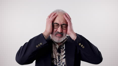 stressed senior man with headache
