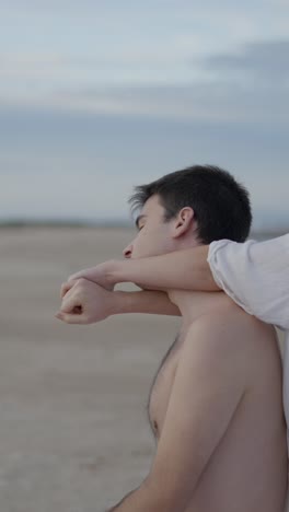 couple sharing a tender embrace on a beach