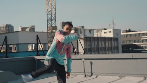 dancing-man-breakdancing-on-rooftop-in-city-hip-hop-dancer-practicing-dance-routine-with-hand-stand-performing-freestyle-moves-in-city