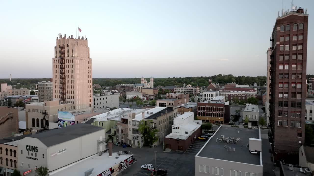 Jackson, Michigan downtown skyline at dusk with drone video moving sideways right to left