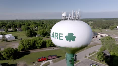 Clare,-Michigan-water-tower-with-drone-video-moving-in-a-circle