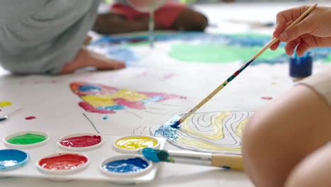 children painting together