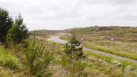 Shot-of-a-single-track-road-junction-on-the-peatland-of-the-Isle-of-Lewis