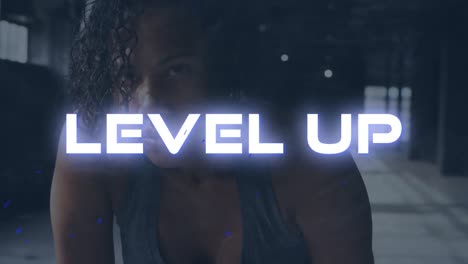 animation of level up text over mixed race woman exercising indoors