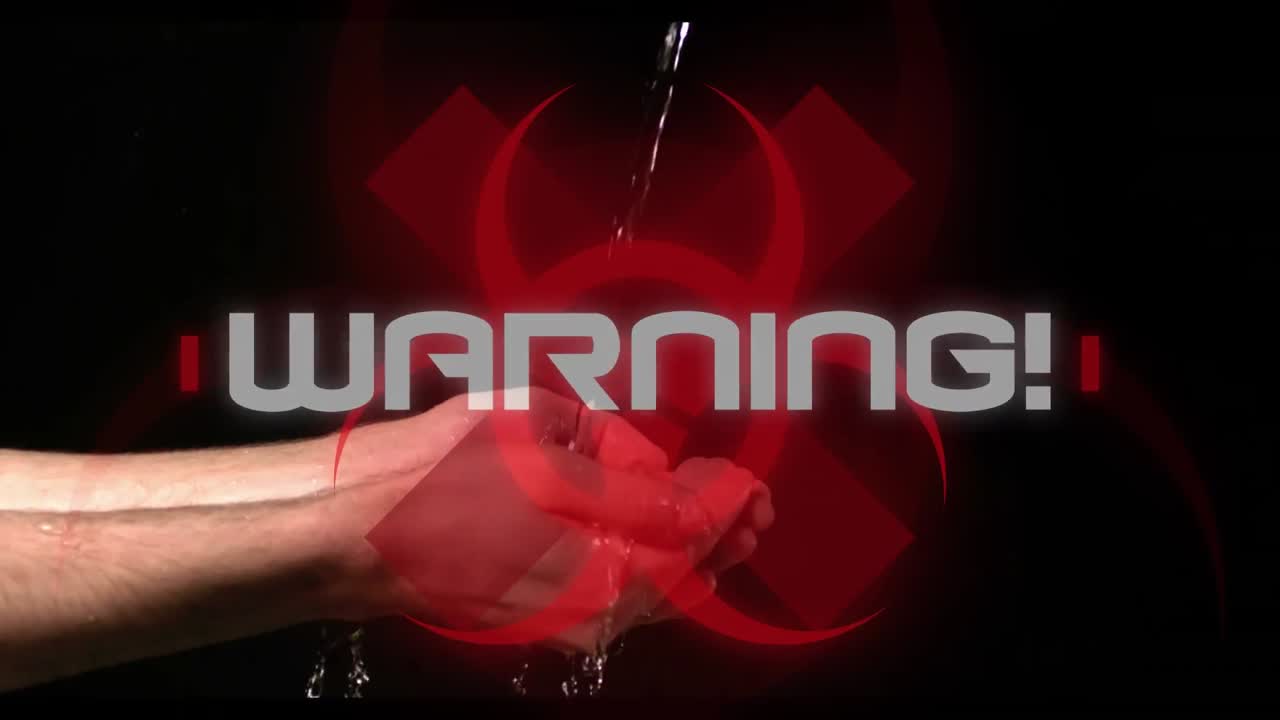 단어 경고! 검은 바탕에 손을  ⁇ 는 사람 위에 건강 위험 표지판 위에 쓰여져 있습니다.