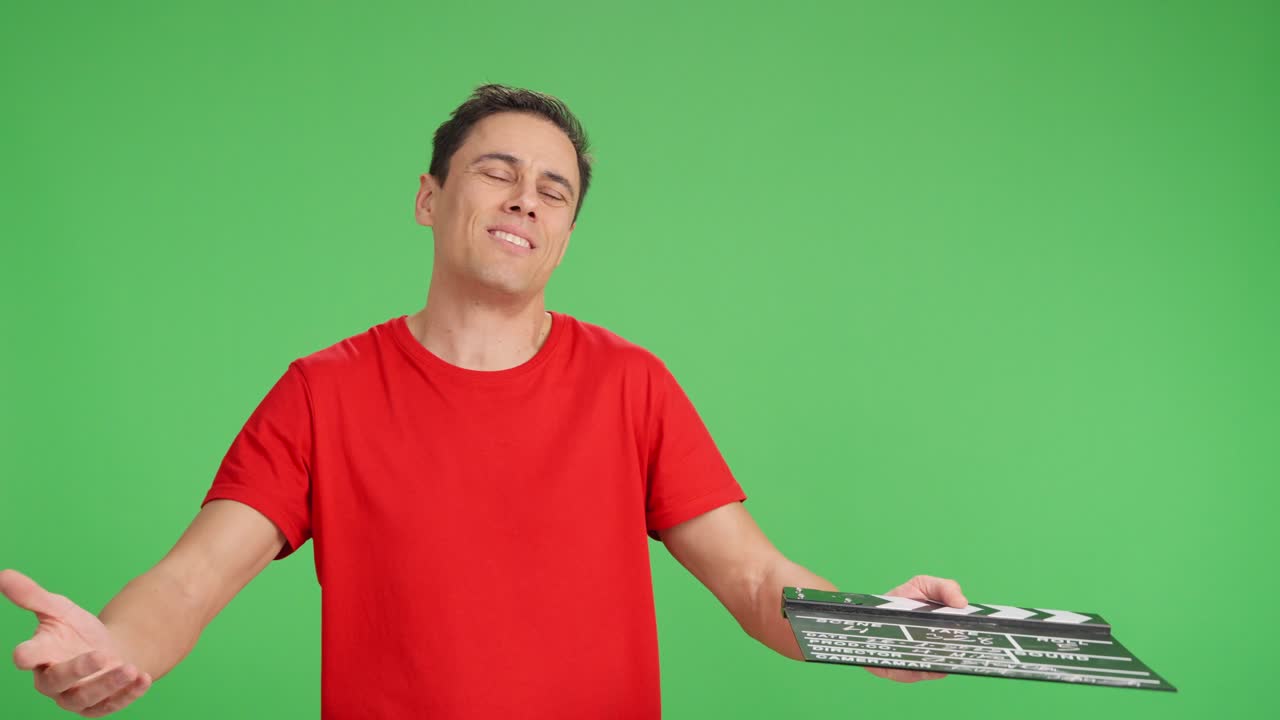 Film director getting angry and frustrated on a chroma key