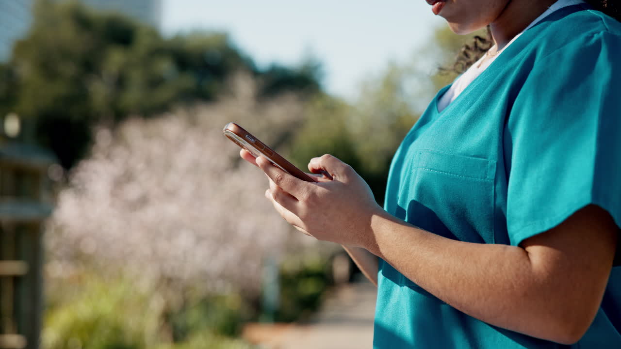 Nurse using mobile phone