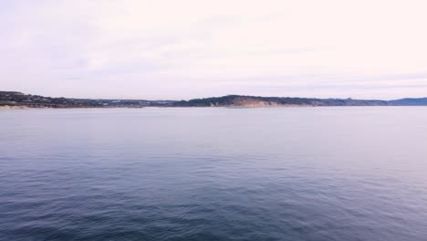 drone view of delmar coastline from the ocean