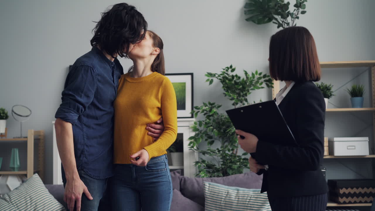 Real Estate Agent Meets Couple for Home Inspection