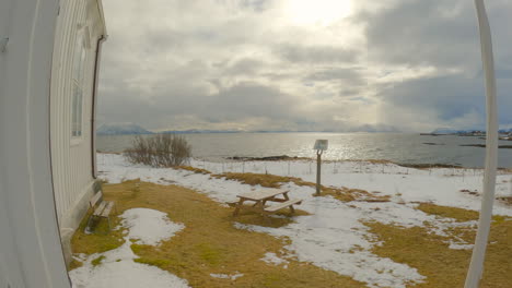 Revealing-the-scenery-view-in-front-of-Dverberg-Church-on-Andoya-in-Norway,-Vesteralen