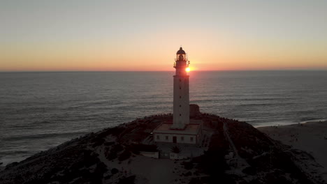 aerial view of cape trafalgar lighthouse at sunset