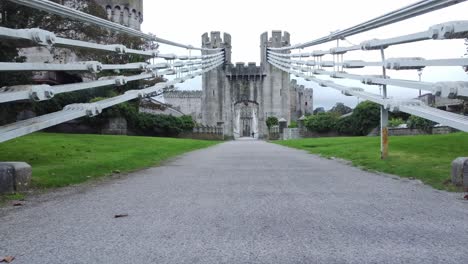 conwy castle medieval landmark pathway cables engineering low angle push in