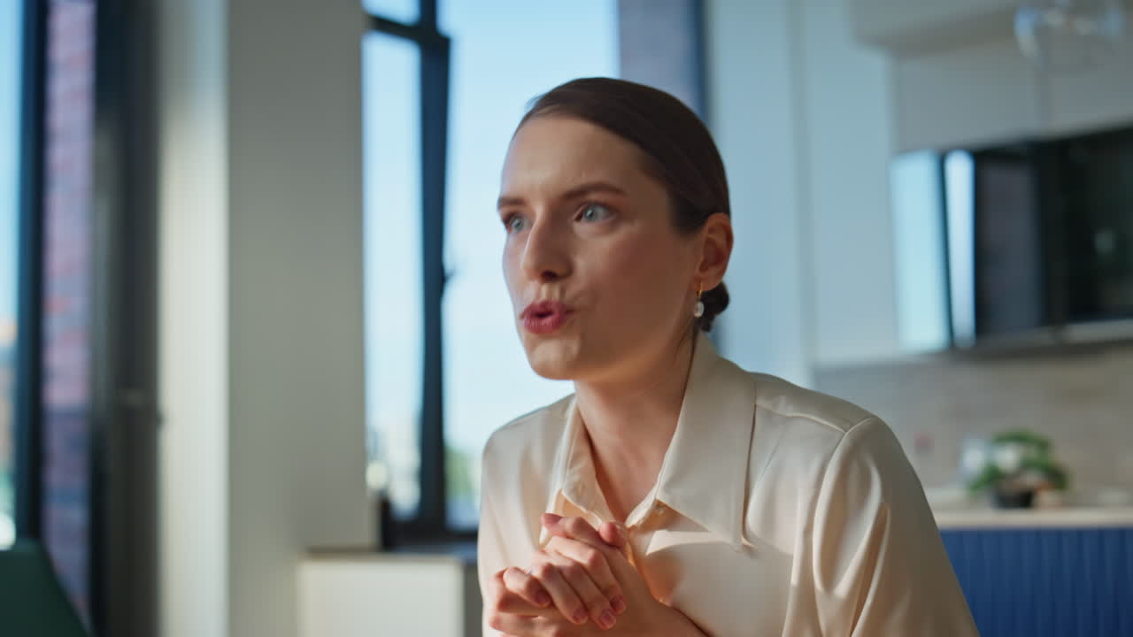 Woman smiling virtual meeting using laptop in home closeup. Happy businesswoman