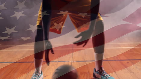 animación de la bandera de los estados unidos de américa sobre un jugador de baloncesto afroamericano