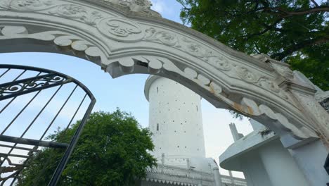 white architecture and tower of a religious site