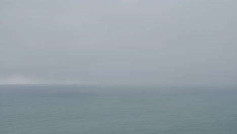 horizon of sea and sky on cloudy day