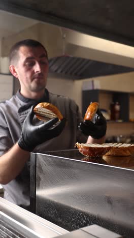 chef preparing bagels for sandwiches