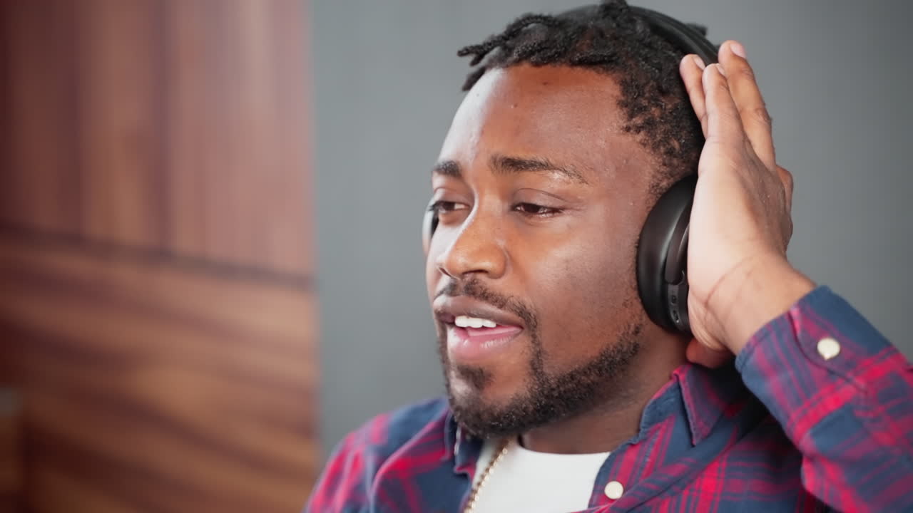 Man Listening to Music with Headphones