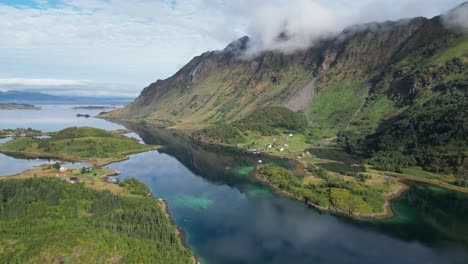 fjord, nature and mountain landscape in grindoya, lofoten islands, norway - aerial 4k