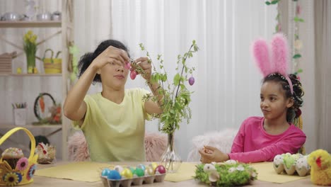 mother and daughter celebrating easter