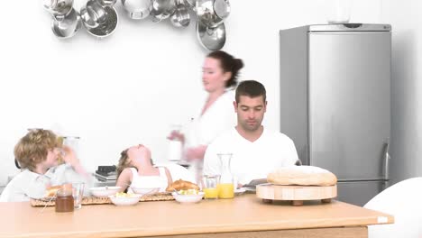 family at home having breakfast