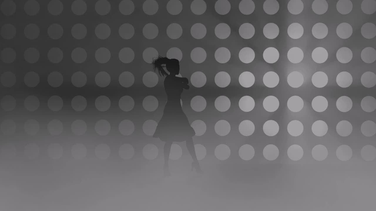 A modern youth dance performed by a graceful and sexy female silhouette, in the smoke against the backdrop of spotlights