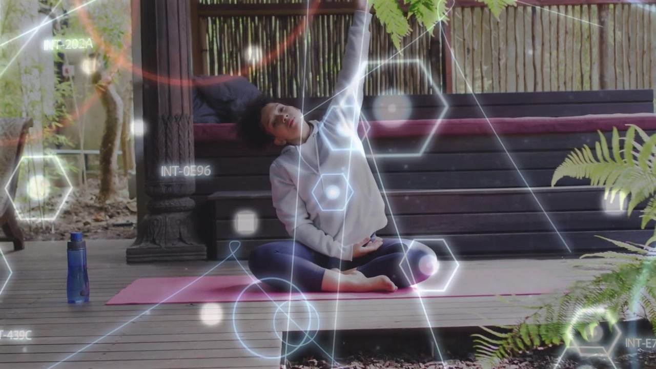 Woman focusing breath and initiating yoga side stretch on pink mat, overlay guiding posture