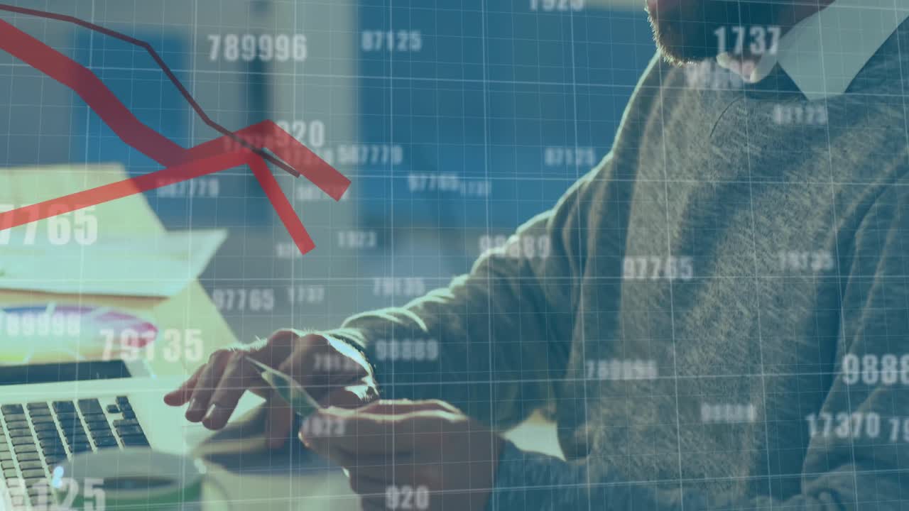 Animation of numbers changing and red lines moving over man paying online using laptop