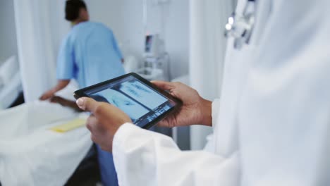 female doctor using digital tablet in ward at hospital 4k