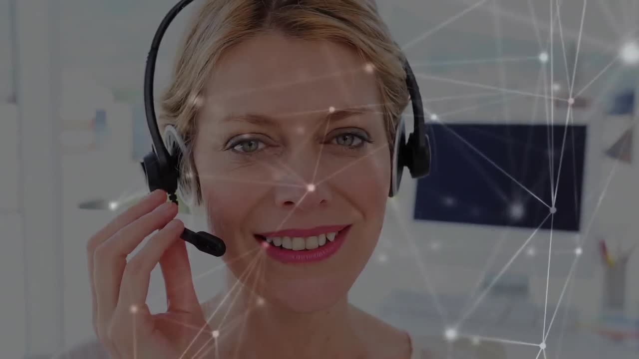 Animation of network of connections over businesswoman wearing phone headset