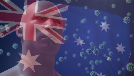 Australian-flag-waving-against-Covid-19-cells-and-human-head-model-wearing-face-mask