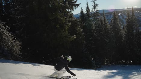 4k-slowmotion-tracking-of-woman-skiing-and-carving-while-going-downhill-at-high-speed-on-the-piste-on-a-sunny-winter-day-in-Norway