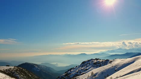 amazing panning of alpine mountain range in italy on sunny day