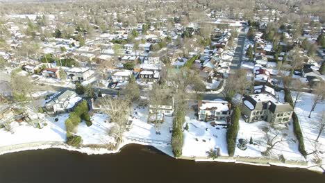 aerial - residential sector in a very snowy winter in ottawa, canada, wide shot