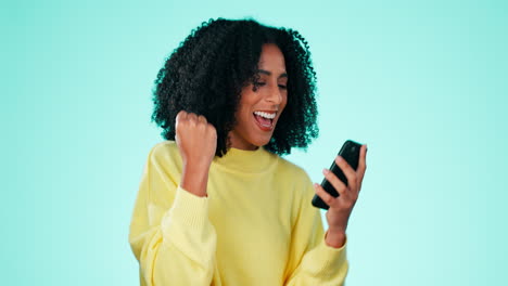 Winning,-yes-and-phone-of-black-woman-isolated