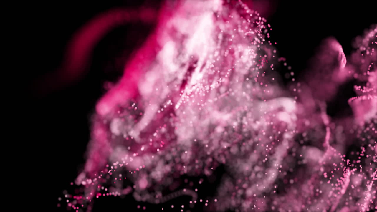 Abstract animation of pink and white particles swirling in dark background