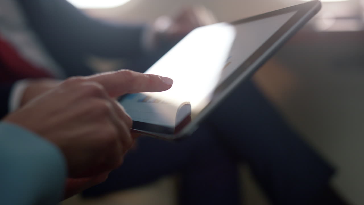 Businesswoman hands holding tablet computer closeup. Partners checking diagram