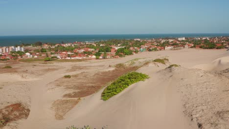 Aerial:-Buggy-driving-through-the-dunes-of-Cumbuco