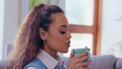 home, coffee and woman on a couch