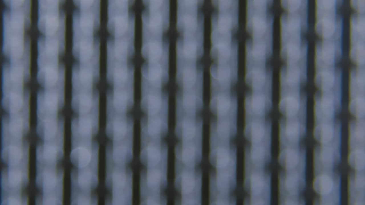 Vape RDA coil, mesh close-up under microscope