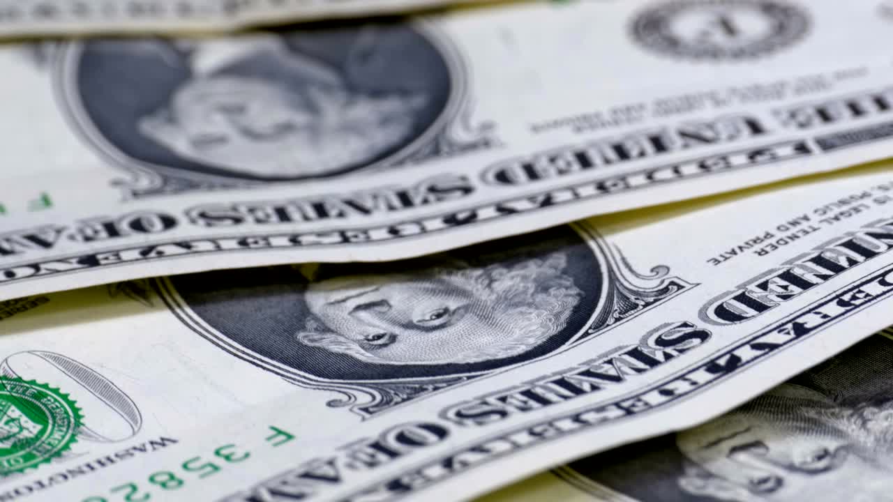 Banconote americane da 1 dollaro che ruotano.