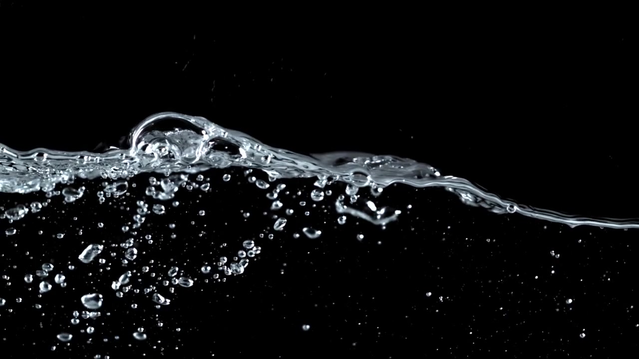 Clear Water Splashing and Waving on Black Background